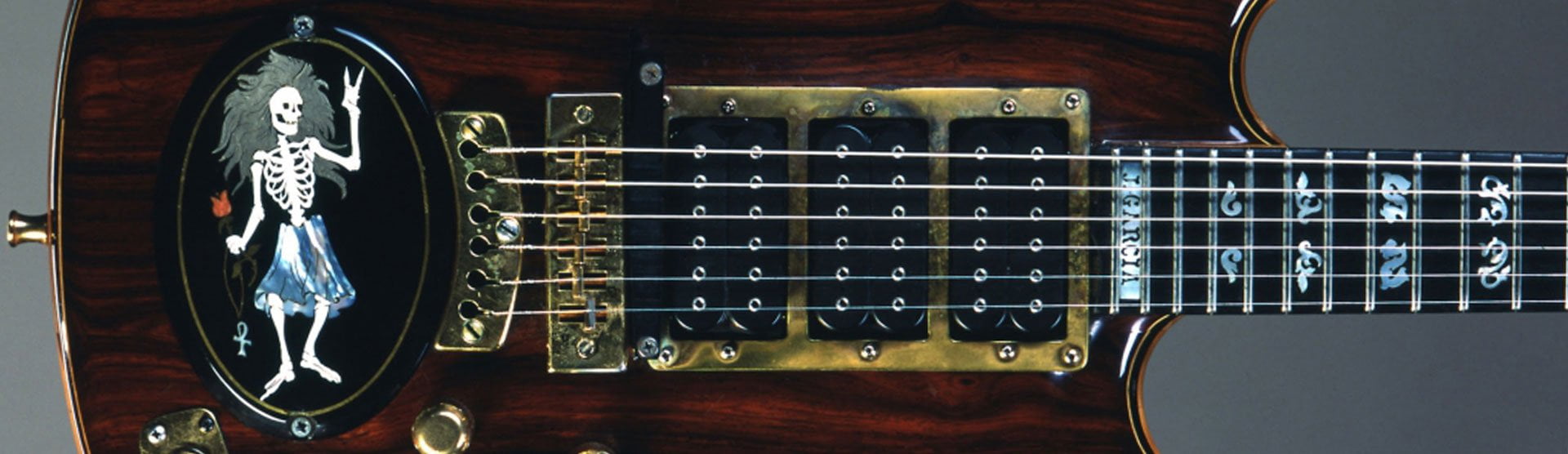 Completes Rosebud — his most advanced guitar